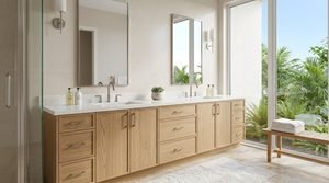 Custom light oak bathroom cabinets with a double vanity and quartz countertop